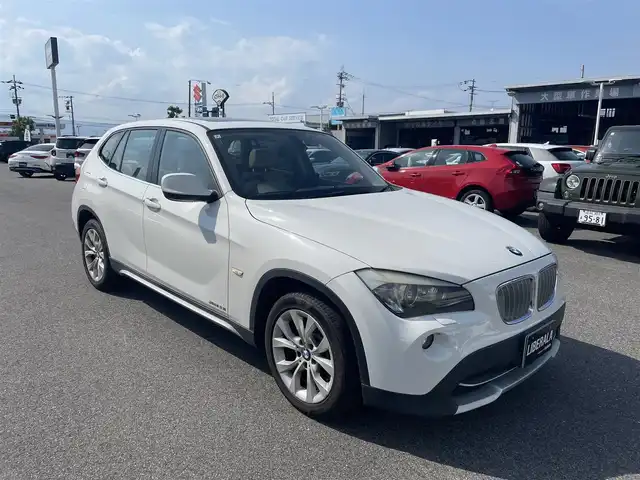 ＢＭＷ Ｘ１ 滋賀県 2011(平23)年 16.5万km 白 サンルーフ/レザーシート（ベージュ)/パワーシート(D/N席)/社外ナビ/Bカメラ/TV/BT/USB/ドラレコ/ルームミラーETC