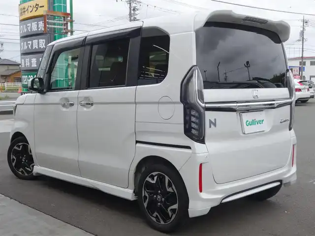 ホンダ Ｎ ＢＯＸ カスタム G L ターボ ホンダセンシング 静岡県 2020(令2)年 4.7万km プラチナホワイトパール ワンオーナー・禁煙車/車検令和9年2月まで/ゆとりのターボエンジン/ホンダセンシング/　衝突軽減ブレーキ・誤発進抑制/　後方誤発進抑制・ACC・LKA/　オートマチックハイビーム/　標識認識機能/LEDヘッドライト・フォグ/リョウガワパワースライドドア/パナソニックストラーダSDナビ/　DVD・CD・BT・USB・iPOD/　フルセグTV・Bカメラ/ビルトインETC/コムテック前後ドライブレコーダー/前席シートヒーター/パドルシフト/スマートキー2個/純正サイドカーテン/純正フロアマット・バイザー/ジュンセイマッドガード/プライバシーガラス