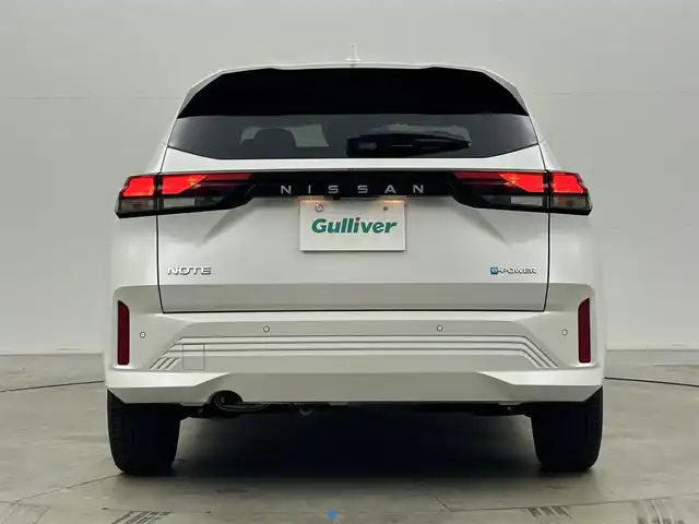 日産 ノート X 岡山県 2024(令6)年 0.3万km ピュアホワイトパール 純正9インチディスプレイオーディオ/Bluetooth/地デジ/バックカメラ/エマージェンシーブレーキ/ETC/アダプティブLEDライト/プッシュスタート /スマートキー/オートライト/オートホールド /コーナーセンサー/フロアマット/オートハイビーム /踏み間違い防止/サイド/カーテンエアバッグ/新車保証書/取扱説明書