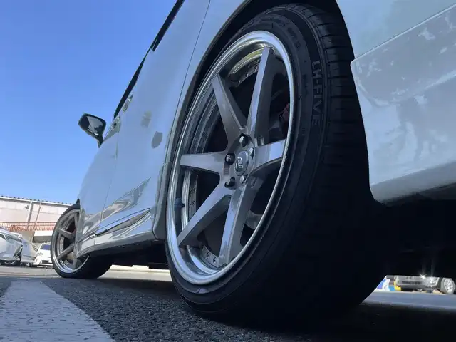 トヨタ アルファード エグゼクティブ ラウンジ 埼玉県 2015(平27)年 13万km ラグジュアリーホワイトパールクリスタルシャインガラスフレーク /4WD//Wサンルーフ//JBL純正10型メモリナビ//フルセグTV//全方位カメラ//フリップダウンモニター//CD/DVD/Bluetooth//黒レザーシート//前2席パワーシート//前2席&2列目シートヒーター//2列目エアシート//助手席&2列目オットマン//両側パワースライドドア//パワーバックドア//アダプティブクルーズコントロール//ビルトインETC//スマートキー//LEDヘッドライト//ステアリングヒーター//PCS衝突軽減ブレーキ//W.サイドエアバッグ//カーテン.ニーエアバッグ//ABS//横滑り防止装置//クリアランスソナー//オートライト/オートハイビーム//スモークフィルム//ドアバイザー//モデリスタエアロ//TEIN車高調//社外21インチAW//新車時保証書//取扱説明書//ナビ取説