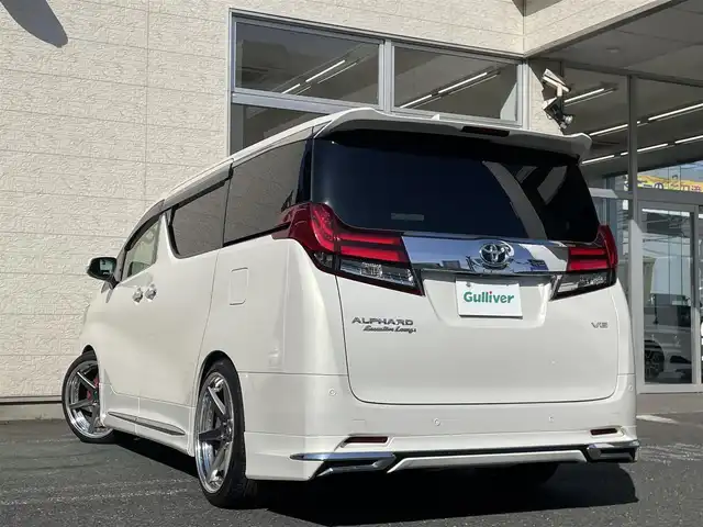 トヨタ アルファード エグゼクティブ ラウンジ 埼玉県 2015(平27)年 13万km ラグジュアリーホワイトパールクリスタルシャインガラスフレーク /4WD//Wサンルーフ//JBL純正10型メモリナビ//フルセグTV//全方位カメラ//フリップダウンモニター//CD/DVD/Bluetooth//黒レザーシート//前2席パワーシート//前2席&2列目シートヒーター//2列目エアシート//助手席&2列目オットマン//両側パワースライドドア//パワーバックドア//アダプティブクルーズコントロール//ビルトインETC//スマートキー//LEDヘッドライト//ステアリングヒーター//PCS衝突軽減ブレーキ//W.サイドエアバッグ//カーテン.ニーエアバッグ//ABS//横滑り防止装置//クリアランスソナー//オートライト/オートハイビーム//スモークフィルム//ドアバイザー//モデリスタエアロ//TEIN車高調//社外21インチAW//新車時保証書//取扱説明書//ナビ取説