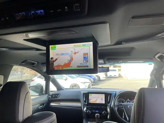 トヨタ アルファード エグゼクティブ ラウンジ 埼玉県 2015(平27)年 13万km ラグジュアリーホワイトパールクリスタルシャインガラスフレーク /4WD//Wサンルーフ//JBL純正10型メモリナビ//フルセグTV//全方位カメラ//フリップダウンモニター//CD/DVD/Bluetooth//黒レザーシート//前2席パワーシート//前2席&2列目シートヒーター//2列目エアシート//助手席&2列目オットマン//両側パワースライドドア//パワーバックドア//アダプティブクルーズコントロール//ビルトインETC//スマートキー//LEDヘッドライト//ステアリングヒーター//PCS衝突軽減ブレーキ//W.サイドエアバッグ//カーテン.ニーエアバッグ//ABS//横滑り防止装置//クリアランスソナー//オートライト/オートハイビーム//スモークフィルム//ドアバイザー//モデリスタエアロ//TEIN車高調//社外21インチAW//新車時保証書//取扱説明書//ナビ取説