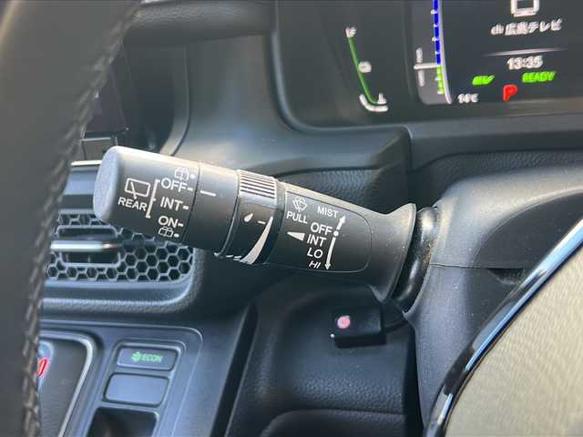 ホンダ ステップワゴン スパーダ eHEV 広島県 2023(令5)年 4.9万km プラチナホワイトパール 禁煙/ホンダセンシング/●衝突軽減ブレーキ（CMBS）/●誤発進抑制機能/●後方誤発進抑制機能/●近距離衝突軽減ブレーキ/●歩行者事故低減ステアリング/●路外逸脱抑制機能/●渋滞追従機能付アダプティブクルーズコントロール（ACC）/●車線維持支援システム（LKAS）/●トラフィックジャムアシスト（渋滞運転支援機能）/●先行車発進お知らせ機能●標識認識機能/●オートハイビーム/●アダプティブドライビングビーム/BSi/コーナーセンサー/純正11.4型ナビ（LXM-237VFi）/・フルセグ/CD/DVD/SD/MusicRack/BT/スマホ連携/バックカメラ/両側パワースライドドア/パワーテールゲート/減速セレクター/電動パーキングブレーキ/オートブレーキホールド/前席シートヒーター/コンビシート/オットマン/LEDアクティブコーナリングライト/フォグランプ/LEDシーケンシャルターンランプ/トリプルゾーンエアコン/スマートキー/プッシュスタート/スペアキー/ETC2.0/ドアバイザー/AC100V100W電源（トランクパネル内）