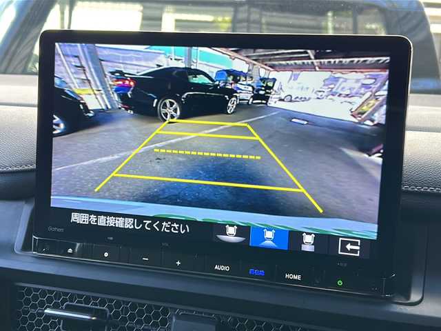 ホンダ ステップワゴン スパーダ eHEV 広島県 2023(令5)年 4.9万km プラチナホワイトパール 禁煙/ホンダセンシング/●衝突軽減ブレーキ（CMBS）/●誤発進抑制機能/●後方誤発進抑制機能/●近距離衝突軽減ブレーキ/●歩行者事故低減ステアリング/●路外逸脱抑制機能/●渋滞追従機能付アダプティブクルーズコントロール（ACC）/●車線維持支援システム（LKAS）/●トラフィックジャムアシスト（渋滞運転支援機能）/●先行車発進お知らせ機能●標識認識機能/●オートハイビーム/●アダプティブドライビングビーム/BSi/コーナーセンサー/純正11.4型ナビ（LXM-237VFi）/・フルセグ/CD/DVD/SD/MusicRack/BT/スマホ連携/バックカメラ/両側パワースライドドア/パワーテールゲート/減速セレクター/電動パーキングブレーキ/オートブレーキホールド/前席シートヒーター/コンビシート/オットマン/LEDアクティブコーナリングライト/フォグランプ/LEDシーケンシャルターンランプ/トリプルゾーンエアコン/スマートキー/プッシュスタート/スペアキー/ETC2.0/ドアバイザー/AC100V100W電源（トランクパネル内）