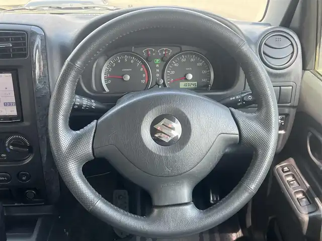 スズキ ジムニー ランドベンチャー 秋田県 2008(平20)年 10.4万km オリーブグレーメタリック 社外ナビ/フルセグ/ターボ/リモコンキー/バックカメラ/純正アルミ/D席シートヒーター/MTモード付AT/純正フロアマット/純正ドアバイザー/ルーフレール/背面タイヤ/パワーステアリング/パワーウィンドウ/レベライザー/電動格納ウィンカーミラー/保証書/取扱説明書/記録簿