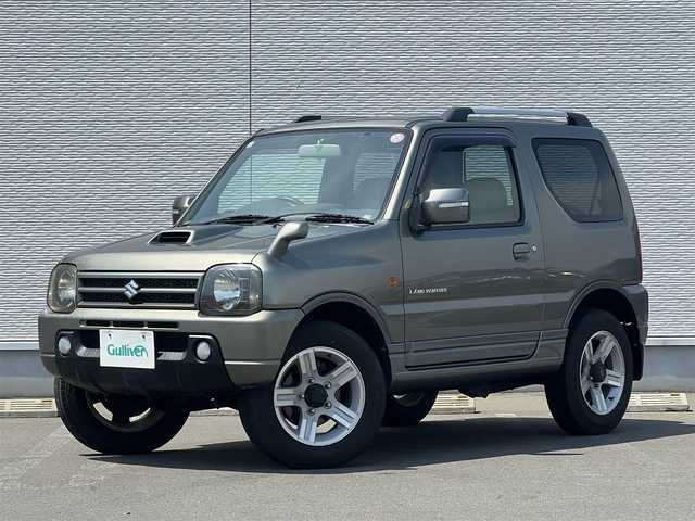 スズキ ジムニー ランドベンチャー 秋田県 2008(平20)年 10.4万km オリーブグレーメタリック 社外ナビ/フルセグ/ターボ/バックカメラ/リモコンキー/純正アルミ/運転席席シートヒーター/MTモード付AT/純正フロアマット/純正ドアバイザー/ルーフレール/背面タイヤ/パワーステアリング/パワーウィンドウ/レベライザー/電動格納ウィンカーミラー/保証書/取扱説明書/記録簿