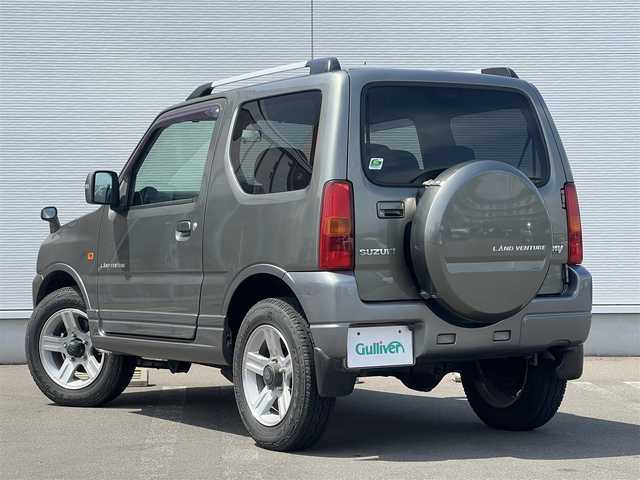 スズキ ジムニー ランドベンチャー 秋田県 2008(平20)年 10.4万km オリーブグレーメタリック 社外ナビ/フルセグ/ターボ/バックカメラ/リモコンキー/純正アルミ/運転席席シートヒーター/MTモード付AT/純正フロアマット/純正ドアバイザー/ルーフレール/背面タイヤ/パワーステアリング/パワーウィンドウ/レベライザー/電動格納ウィンカーミラー/保証書/取扱説明書/記録簿