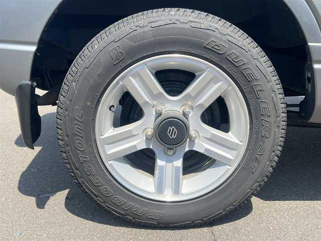 スズキ ジムニー ランドベンチャー 秋田県 2008(平20)年 10.4万km オリーブグレーメタリック 社外ナビ/フルセグ/ターボ/バックカメラ/リモコンキー/純正アルミ/運転席席シートヒーター/MTモード付AT/純正フロアマット/純正ドアバイザー/ルーフレール/背面タイヤ/パワーステアリング/パワーウィンドウ/レベライザー/電動格納ウィンカーミラー/保証書/取扱説明書/記録簿