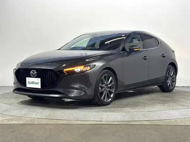 マツダ マツダ３ファストバック 15S ツーリング 大阪府 2020(令2)年 1.2万km マシーングレープレミアムM 純正ナビTV 360カメラ ETC ヘッドアップディスプレイ 衝突軽減 レーダーC クリアランスソナー BSM レーンアシスト スマートキー Pスタート オートハイビーム
