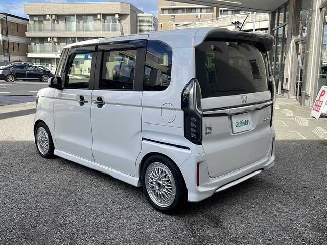 ホンダ Ｎ ＢＯＸ カスタム G L ターボ ホンダセンシング 兵庫県 2019(平31)年 4.2万km プラチナホワイトパール ワンオーナー/HondaSENSING（衝突被害軽減システム）/車高調/Gathersディーラーオプションナビ/　Bluetooth/SD/DVD/USB/iPod/AM/FM/フルセグテレビ（走行中視聴可能）/両側パワースライドドア/バックカメラ/ビルトインETC/前方ドライブレコーダー/パドルシフト/ベンチシート/チップアップシート/フルフラットシート/アイドリングストップ/アダプティブクルーズコントロール/アンチロック・ブレーキ・システム/レーンキープアシスト/後方コーナーセンサー/盗難防止装置/横滑り防止装置/社外アルミホイール/純正アルミホイール付属/純正サスペンション付属/純正フロアマット/パワーステアリング/パワーウィンドウ/LEDヘッドライト/スマートキー/スペアキー（1本）/保証書/取扱説明書