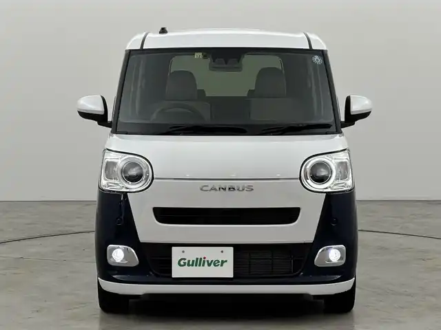 ダイハツ ムーヴ キャンバス ストライプス G 福岡県 2022(令4)年 1.1万km シャイニングホワイトパール/レーザーブルークリスタルシャイン 社外ディスプレイオーディオ　/バックカメラ　/両側パワースライドドア　/ワイヤレス充電　/ＥＴＣ　/ホッとカップホルダー　/衝突軽減　/レーンキープ　/コーナーセンサー　/アクセル踏み間違い防止　/横滑り防止　/シートヒーター　/ＬＥＤ