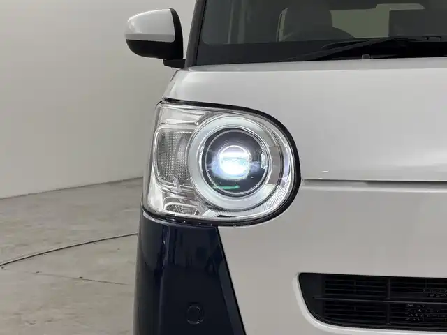 ダイハツ ムーヴ キャンバス ストライプス G 福岡県 2022(令4)年 1.1万km シャイニングホワイトパール/レーザーブルークリスタルシャイン 社外ディスプレイオーディオ　/バックカメラ　/両側パワースライドドア　/ワイヤレス充電　/ＥＴＣ　/ホッとカップホルダー　/衝突軽減　/レーンキープ　/コーナーセンサー　/アクセル踏み間違い防止　/横滑り防止　/シートヒーター　/ＬＥＤ