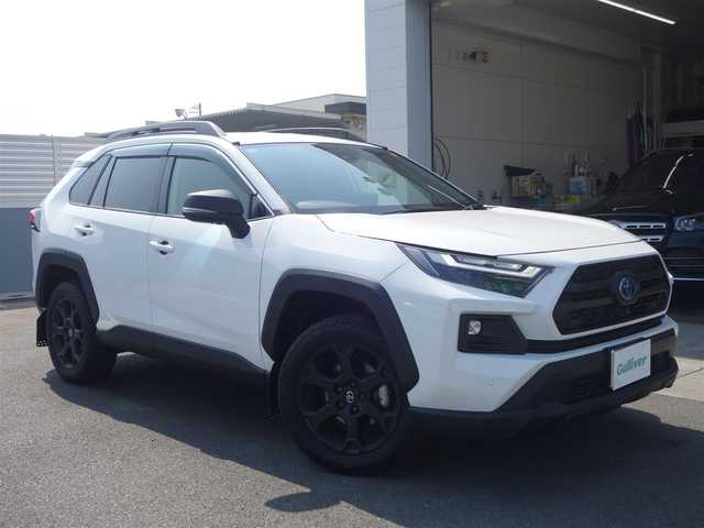 トヨタ ＲＡＶ４ HV アドベンチャー オフロードPKGⅡ 静岡県 2024(令6)年 0.3万km スーパーホワイトⅡ ワンオーナー／禁煙車/走行距離2951キロ/車検9年3月26日/トヨタセーフティセンス/　・プリクラッシュセーフティ/　・レーンとレーシングアシスト/　・オートマチックハイビーム/　・ロードサインアシスト/　・レーダークルーズコントロール/　・先行車発進のお知らせ/10.5インチディスプレイオーディオプラス/　ナビ/BT/USB/HDMI/AM.FM/フルセグTV/AppleCarPlay／Android audio/ETC2.0/パノラミックビューモニター/BSM/デジタルインナーミラー/ステアリングヒーター/前席シートヒーター／エアシート/運転席メモリー機能付パワーシート/パワーバックドア／ハンズフリー/ルーフレール/純正専用サスペンション/TRDマッドガード/ドアハンドルプロテクター/LEDヘッドライト／オートマチックハイビーム/社外3Dフロアマット／トランクマット/純正ドアバイザー/取扱説明書／保証書