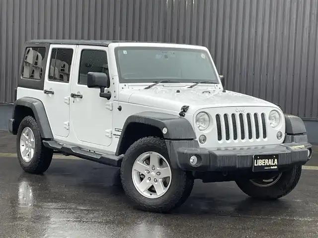 クライスラー・ジープ ジープ ラングラー 青森県 2016(平28)年 5.9万km ブライトホワイト 社外メモリナビ/(フルセグTV/CD/DVD/Bluetooth)/後席モニター/バックカメラ/ドライブレコーダー　前のみ/4WD/ETC/サイドモニター/純正アルミホイール/純正フロアマット/オートライト/保証書取説　あり