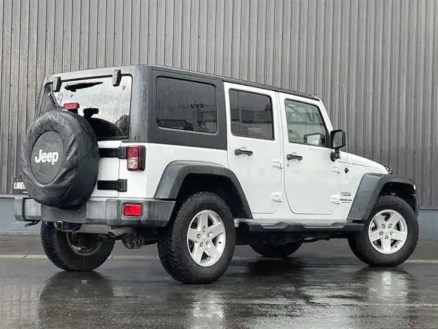 クライスラー・ジープ ジープ ラングラー 青森県 2016(平28)年 5.9万km ブライトホワイト 社外メモリナビ/(フルセグTV/CD/DVD/Bluetooth)/後席モニター/バックカメラ/ドライブレコーダー　前のみ/4WD/ETC/サイドモニター/純正アルミホイール/純正フロアマット/オートライト/保証書取説　あり