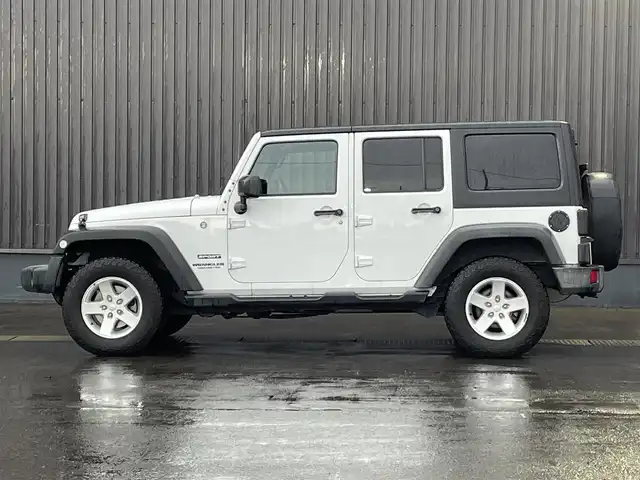 クライスラー・ジープ ジープ ラングラー 青森県 2016(平28)年 5.9万km ブライトホワイト 社外メモリナビ/(フルセグTV/CD/DVD/Bluetooth)/後席モニター/バックカメラ/ドライブレコーダー　前のみ/4WD/ETC/サイドモニター/純正アルミホイール/純正フロアマット/オートライト/保証書取説　あり