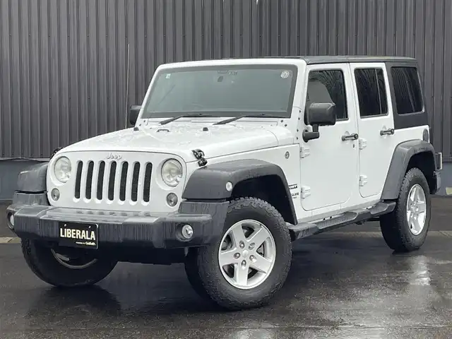 クライスラー・ジープ ジープ ラングラー 青森県 2016(平28)年 5.9万km ブライトホワイト 社外メモリナビ/(フルセグTV/CD/DVD/Bluetooth)/後席モニター/バックカメラ/ドライブレコーダー　前のみ/4WD/ETC/サイドモニター/純正アルミホイール/純正フロアマット/オートライト/保証書取説　あり