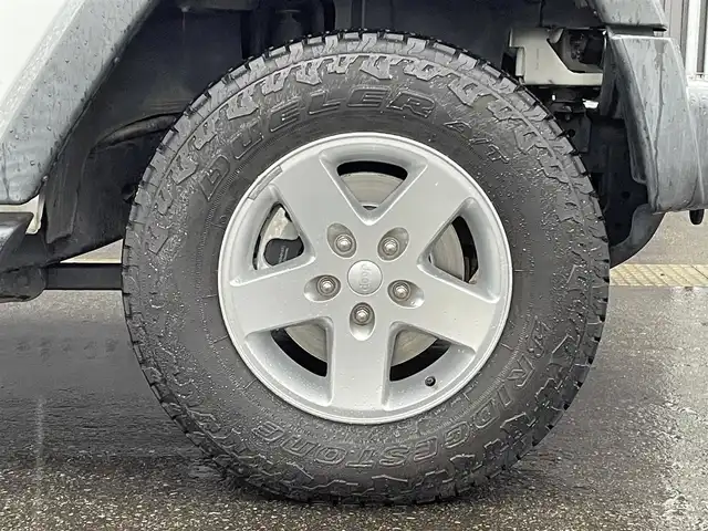 クライスラー・ジープ ジープ ラングラー 青森県 2016(平28)年 5.9万km ブライトホワイト 社外メモリナビ/(フルセグTV/CD/DVD/Bluetooth)/後席モニター/バックカメラ/ドライブレコーダー　前のみ/4WD/ETC/サイドモニター/純正アルミホイール/純正フロアマット/オートライト/保証書取説　あり