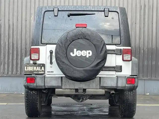 クライスラー・ジープ ジープ ラングラー 青森県 2016(平28)年 5.9万km ブライトホワイト 社外メモリナビ/(フルセグTV/CD/DVD/Bluetooth)/後席モニター/バックカメラ/ドライブレコーダー　前のみ/4WD/ETC/サイドモニター/純正アルミホイール/純正フロアマット/オートライト/保証書取説　あり