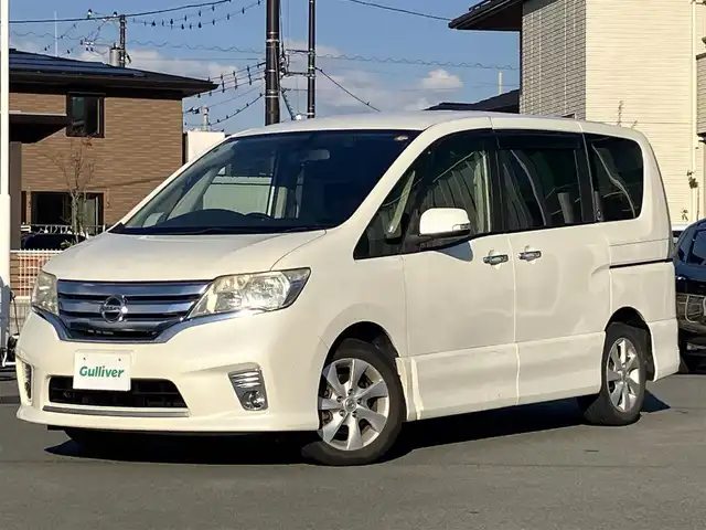 日産 セレナ ハイウェイスター 静岡県 2012(平24)年 14.5万km ブリリアントホワイトパール エンジンスタートボタン/パワーステアリング/パワーウィンドウ/アイドリングストップ/スマートキー/Wオートエアコン/クルーズコントロール/ETC/バックカメラ/純正ナビ（CD/DVD/BT/フルセグ）/三列シート/ドライブレコーダー/純正フロアマット/ウォークスルー/布シート/両側パワースライドドア/純正アルミホイール/ABS/横滑り防止装置/盗難防止装置/オートライト/キセノン/Wエアバッグ