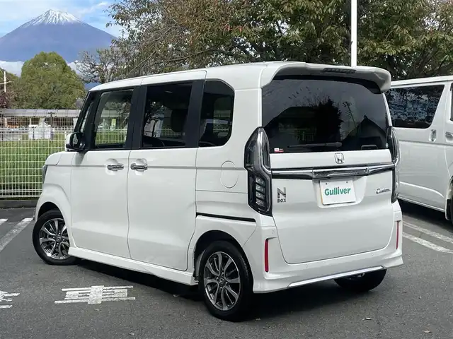ホンダ Ｎ ＢＯＸ カスタム L 静岡県 2023(令5)年 0.6万km プラチナホワイトパール 1オーナー /ホンダセンシング /ACC/左側パワスラ /ディスプレイオーディオ  /Bカメラ /バックソナー /前席シートヒーター　/オートライト /ブレーキホールド　/ステアリングスイッチ /ウィンカーミラー /純正14インチAW/ウィンカーミラー/スペアキー /保証書/取説