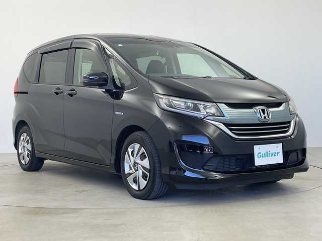 ホンダ フリード＋ ハイブリット G ホンダセンシング 鹿児島県 2016(平28)年 6.9万km クリスタルブラックパール 純正メモリナビ/（AM/FM/CD/DVD/Bluetooth/フルセグ）/ホンダセンシング/・アダプティブ・クルーズ・コントロール（ACC）/・車線維持支援システム（LKAS）/・衝突軽減ブレーキ（CMBS）/・誤発進抑制機能（前進）/・歩行者事故低減ステアリング/・路外逸脱抑制機能/・先行車発進お知らせ機能/・標識認識機能/両側パワースライドドア/ビルトインETC/前後ドライブレコーダー/スマートキー＆プッシュスタート/ステアリングスイッチ/純正フロアマット/ドアバイザー/LEDヘッドライト