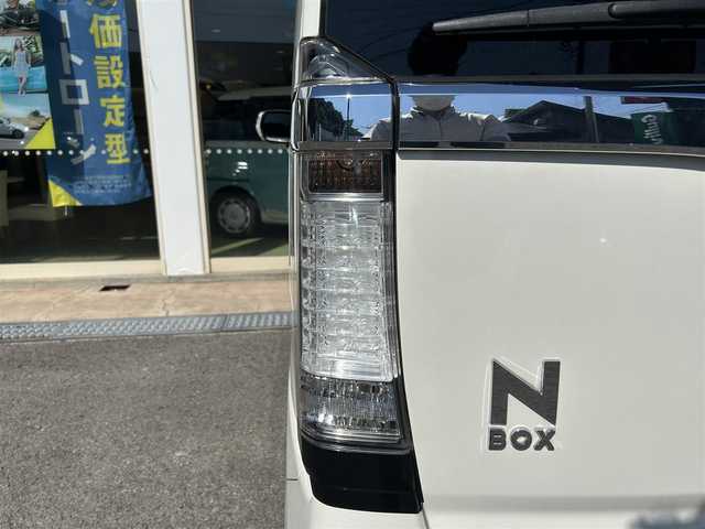 ホンダ Ｎ ＢＯＸ カスタム SSパッケージ 長崎県 2015(平27)年 5.1万km プレミアムホワイトパール 登録時走行距離51068km/HDDナビ(Bluetooth/CD/DVD/フルセグ)/バックカメラ/両側スライドドア/純正AW14インチ/ETC/スマートキー/スペアキー