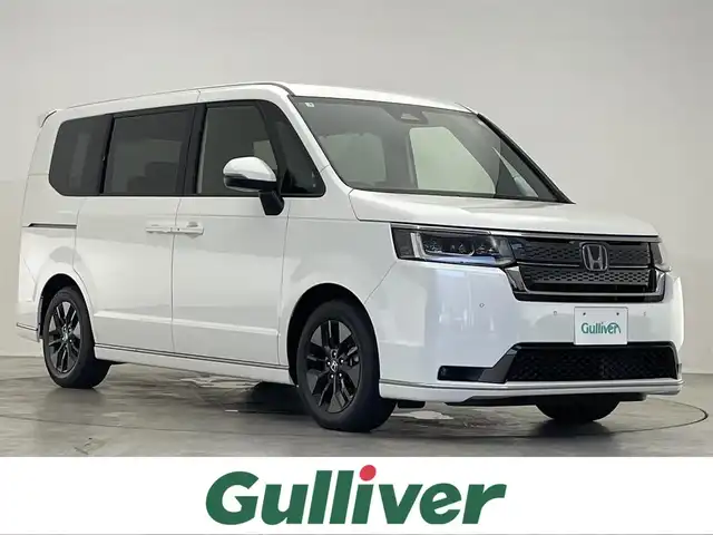 ホンダ ステップワゴン スパーダ eHEV 滋賀県 2025(令7)年 0.1千km プラチナホワイトパール 登録済未使用車/純正11.4型ホンダコネクトナビ/両側パワースライドドア/オートクルーズコントロール/パワーバックドア/ブラインドスポットモニター/ハーフレザーシート/シートヒーター/電子パーキング/LEDヘッドライト/前後ソナー/バックカメラ/純正１６AW