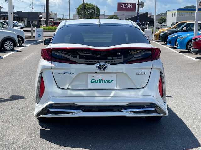 トヨタ プリウス ＰＨＶ S ナビパッケージ 長崎県 2018(平30)年 8.5万km ホワイトパールクリスタルシャイン 〇純正ナビ/〇フルセグTV/〇USB端子/〇AUX入力端子/〇ビルトインETC/〇MODELLISTAエアロ/〇プリクラッシュセーフティシステム/〇ステアリング制御機能付き車線逸脱警報/〇アダプティブハイビームシステム/〇レーダークルーズコントロール/〇LEDヘッドランプ/〇LEDフォグランプ/〇SRSエアバッグ/〇バックカメラ/〇スマートキー/〇充電インレット/〇純正15インチアルミホイール/〇オートエアコン/〇ブラックファブリックシート/〇快適温熱シート/〇スマートエントリー/〇スタートシステム/〇禁煙車
