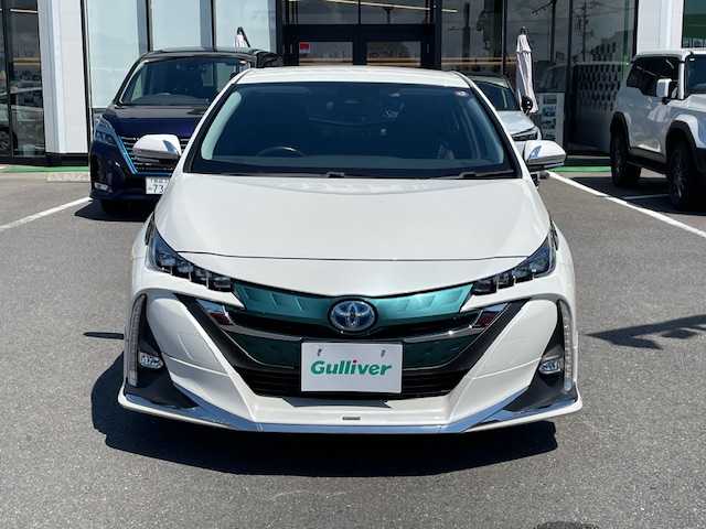 トヨタ プリウス ＰＨＶ S ナビパッケージ 長崎県 2018(平30)年 8.5万km ホワイトパールクリスタルシャイン 〇純正ナビ/〇フルセグTV/〇USB端子/〇AUX入力端子/〇ビルトインETC/〇MODELLISTAエアロ/〇プリクラッシュセーフティシステム/〇ステアリング制御機能付き車線逸脱警報/〇アダプティブハイビームシステム/〇レーダークルーズコントロール/〇LEDヘッドランプ/〇LEDフォグランプ/〇SRSエアバッグ/〇バックカメラ/〇スマートキー/〇充電インレット/〇純正15インチアルミホイール/〇オートエアコン/〇ブラックファブリックシート/〇快適温熱シート/〇スマートエントリー/〇スタートシステム/〇禁煙車