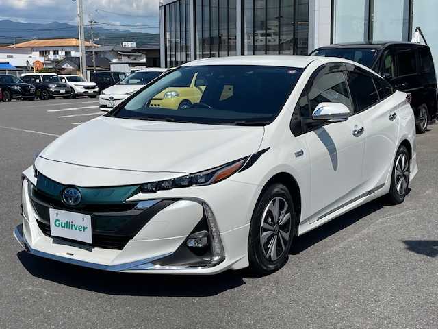 トヨタ プリウス ＰＨＶ S ナビパッケージ 長崎県 2018(平30)年 8.5万km ホワイトパールクリスタルシャイン 〇純正ナビ/〇フルセグTV/〇USB端子/〇AUX入力端子/〇ビルトインETC/〇MODELLISTAエアロ/〇プリクラッシュセーフティシステム/〇ステアリング制御機能付き車線逸脱警報/〇アダプティブハイビームシステム/〇レーダークルーズコントロール/〇LEDヘッドランプ/〇LEDフォグランプ/〇SRSエアバッグ/〇バックカメラ/〇スマートキー/〇充電インレット/〇純正15インチアルミホイール/〇オートエアコン/〇ブラックファブリックシート/〇快適温熱シート/〇スマートエントリー/〇スタートシステム/〇禁煙車