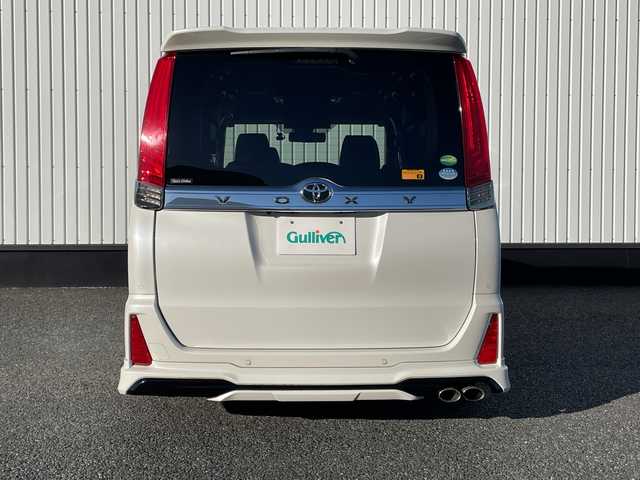 トヨタ ヴォクシー ZS 煌Ⅱ 千葉県 2019(平31)年 3万km ホワイトパールクリスタルシャイン モデリスタエアロ/カロッツェリア10インチナビ/(フルセグTV/BT/CD/DVD/FM/AM)/アルパイン12.8インチフリップダウンモニター/デジタルインナーミラー型前後ドラレコ/TEIN車高調/VALENTIテールランプ/社外エアクリーナー/衝突被害軽減システム/車線逸脱警報/バックカメラ/クルーズコントロール/シートカバー/両側パワースライドドア/横滑り防止装置/アイドリングストップ/LEDヘッドライト/フォグランプ/オートライト/ウィンカーミラー/電動格納ミラー/社外18インチAW/シートリフター/プッシュスタート/スマートキー/フロアマット/スペアキー/取扱説明書