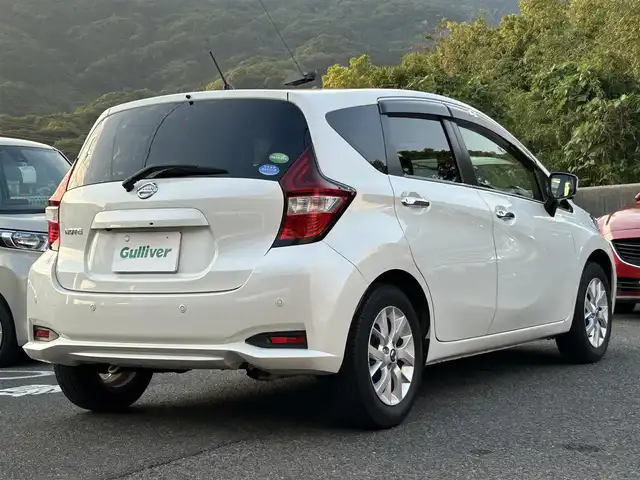 日産 ノート X Vセレクション 長崎県 2020(令2)年 1.5万km ブリリアントホワイトパール ワンオーナー/社外SDナビ(FM/AM/BTオーディオ/フルセグTV/iPod/USB/SD/DISC)/SRSエアバッグ/インテリジェントルームミラー/ステアリングスイッチ/ヒルスタートアシスト/イモビライザー/インテリジェントエマージェンシーブレーキ/LDW/VDC/インテリジェントクルーズコントロール/インテリジェントアラウンドビューモニター/プッシュスタート/スマートキー/純正フロアマット/ドアバイザー/オートライト/純正14インチAW/アイドリングストップ/COMTECドラレコ/ETC/取扱説明書/保証書/ナビ取扱説明書