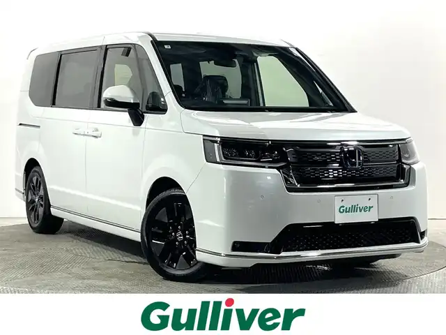 ホンダ ステップワゴン スパーダ eHEV 大阪府 2025(令7)年 0.1千km プラチナホワイトパール 登録済未使用車 純正11.4incナビTV バックカメラ レーダークルコン 衝突軽減ブレーキ レーンアシスト ブラインドSM ハーフレザー シートヒーター 電動リアゲート リアオートエアコン クリアランスソナー