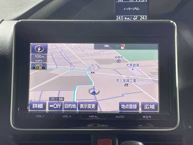 トヨタ ヴォクシー ZS 煌 神奈川県 2015(平27)年 5.7万km ブラッキッシュアゲハガラスフレーク 純正9型ナビ/純正フリップダウン/革巻きステアリング/ECOモード/ウィンカーミラー/横滑り防止装置/純正フロアマット/純正ドアバイザー/純正アルミホイール/両側パワースライドドア/スマートキー/Autoライト/バックカメラ/アイドリングストップ/スペアキー/LEDヘッドライト/電動格納ミラー/フォグランプ/プッシュスタート