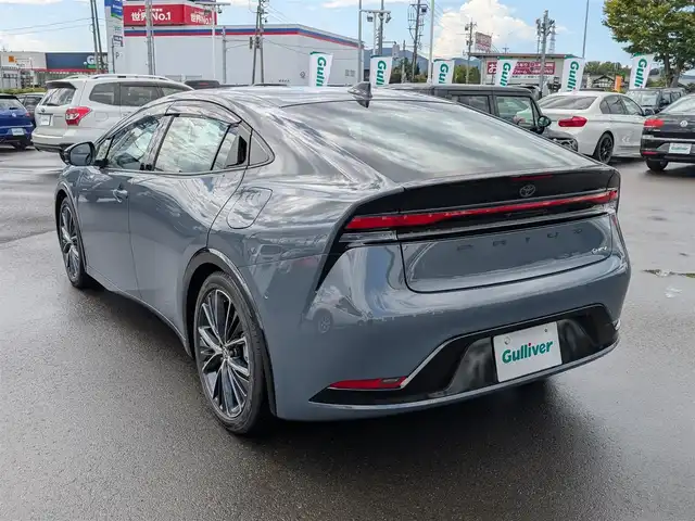 トヨタ プリウス Z 福井県 2025(令7)年 0.1万km グレー ワンオーナー車/純正19インチAW/全方位カメラ/12.3インチコネクトナビ/フルセグテレビ/パワーバックドア/運転席パワーシート/ベンチレーション/ステアリングヒーター/前後ドライブレコーダー/１００V充電/ETC2.0/全車速追従機能付クルーズコントロール/前後コーナーセンサー/自動駐車システム/レザーシート/シートヒーター・エアシート/衝突被害軽減システム/レーンキープアシスト/横滑り防止装置/盗難防止装置/SOSボタン/ダブル＋サイドエアバッグ/カーテンエアバッグ/純正フロアマット/スマートキー
