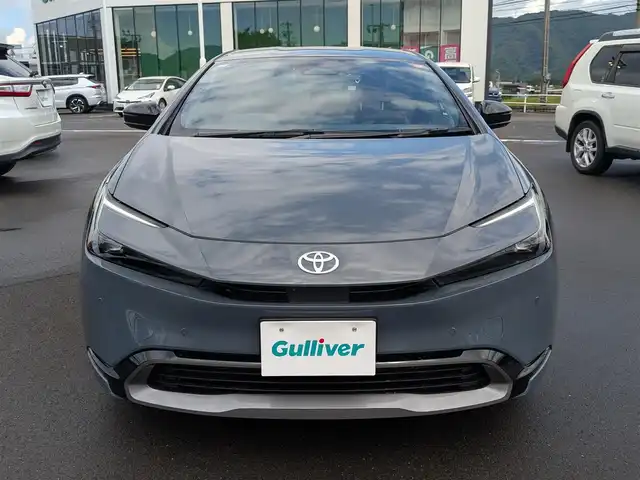 トヨタ プリウス Z 福井県 2025(令7)年 0.1万km グレー ワンオーナー車/純正19インチAW/全方位カメラ/12.3インチコネクトナビ/フルセグテレビ/パワーバックドア/運転席パワーシート/ベンチレーション/ステアリングヒーター/前後ドライブレコーダー/１００V充電/ETC2.0/全車速追従機能付クルーズコントロール/前後コーナーセンサー/自動駐車システム/レザーシート/シートヒーター・エアシート/衝突被害軽減システム/レーンキープアシスト/横滑り防止装置/盗難防止装置/SOSボタン/ダブル＋サイドエアバッグ/カーテンエアバッグ/純正フロアマット/スマートキー