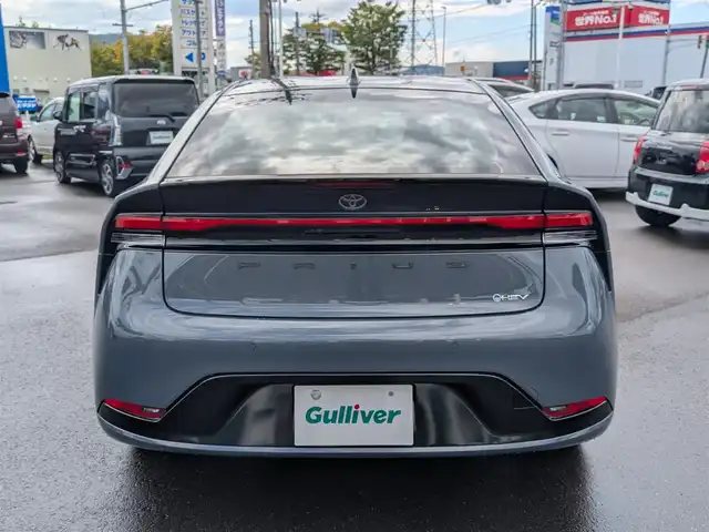 トヨタ プリウス Z 福井県 2025(令7)年 0.1万km グレー ワンオーナー車/純正19インチAW/全方位カメラ/12.3インチコネクトナビ/フルセグテレビ/パワーバックドア/運転席パワーシート/ベンチレーション/ステアリングヒーター/前後ドライブレコーダー/１００V充電/ETC2.0/全車速追従機能付クルーズコントロール/前後コーナーセンサー/自動駐車システム/レザーシート/シートヒーター・エアシート/衝突被害軽減システム/レーンキープアシスト/横滑り防止装置/盗難防止装置/SOSボタン/ダブル＋サイドエアバッグ/カーテンエアバッグ/純正フロアマット/スマートキー