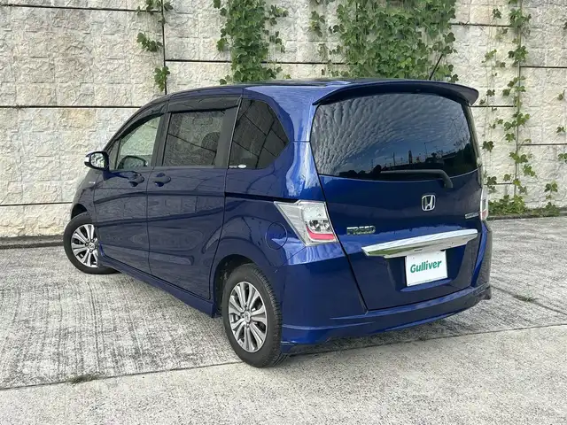 ホンダ フリード ハイブリット ジャストセレクション 長崎県 2012(平24)年 10.1万km コバルトブルーパール ワンオーナー/純正メモリナビ/（CD/DVD/BT/フルセグ）/バックカメラ/フリップダウンモニター/クルーズコントロール/両側パワースライドドア/ハーフレザーシート/オートライト/ETC/電動格納ミラー/純正15インチAW