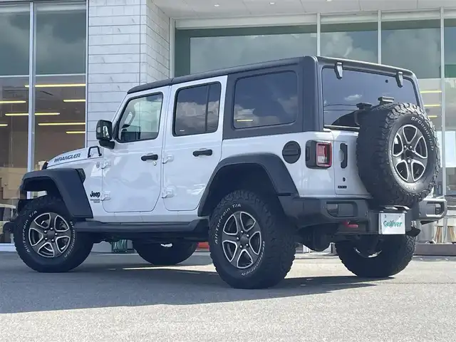 クライスラー・ジープ ジープ ラングラー アンリミテッド スポーツ 兵庫県 2019(令1)年 6.5万km 白 純正ナビ/Bluetooth接続/ETC/バック・サイドカメラ/クルーズコントロール/オートライト/コーナーセンサー/オープン/AUX/スマートキー/純正ゴムマット/フォグランプ/背面タイヤ