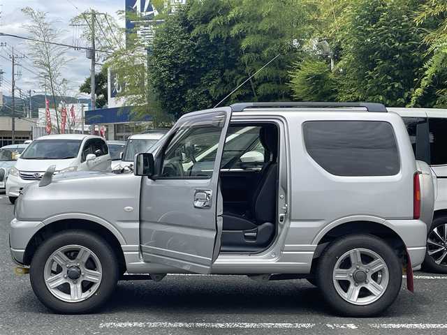 スズキ ジムニー XC 茨城県 2016(平28)年 6.2万km シルキーシルバーメタリック ワンオーナー/ルーフレール/ＥＴＣ/ユピテル社ミラー一体型ドラレコ/ウルトラフルオートタイマーNo.4754/ＦＭ／ＡＭ付きＣＤプレイヤー/ドアヒートミラー/２ＷＤ／４ＷＤ切り替えスイッチ/背面タイヤ（175/80R16）/フォグランプ/ドアヒートミラー/サイドアンダーガーニッシュ/純正リアバンパープレート