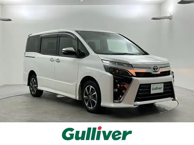 トヨタ ヴォクシー ZS 煌Ⅱ 福井県 2020(令2)年 1.8万km ホワイトパールクリスタルシャイン ECLIPSEナビ/CD/DVD/Bluetooth/フルセグ/両側パワースライドドア/Toyota Safety Sense/・プリクラッシュセーフティーシステム/・レーンキープアシスト/・オートマチックハイビーム/ドライブレコーダー/バックカメラ/LEDヘッドライト/ETC/フォグランプ/スマートキー