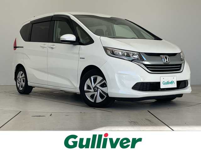 ホンダ フリード ハイブリット G ホンダセンシング 愛知県 2019(令1)年 5万km ホワイトオーキッドパール ホンダセンシング/純正ナビ/両側パワースライドドア/クルーズコントロール/バックカメラ/LEDヘッドライト/オートライト/ドライブレコーダー/ETC/衝突軽減システム/フルセグ/CD DVD/Bluetooth/ステアリングスイッチ/スマートキー/プッシュスタート