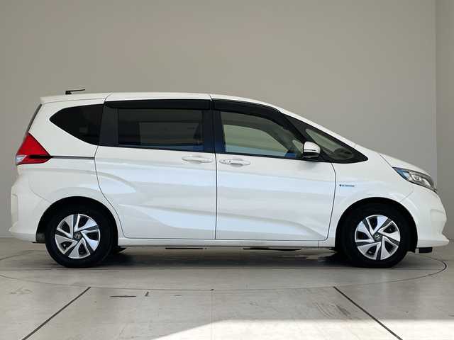 ホンダ フリード ハイブリット G ホンダセンシング 愛知県 2019(令1)年 5万km ホワイトオーキッドパール ホンダセンシング/純正ナビ/両側パワースライドドア/クルーズコントロール/バックカメラ/LEDヘッドライト/オートライト/ドライブレコーダー/ETC/衝突軽減システム/フルセグ/CD DVD/Bluetooth/ステアリングスイッチ/スマートキー/プッシュスタート