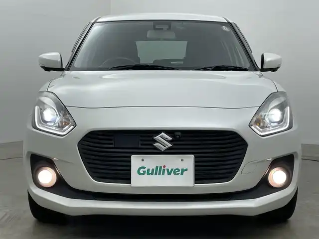 スズキ スイフト HYBRID ML 岡山県 2018(平30)年 5.5万km ピュアホワイトP 全方位モニター用カメラパッケージ/社外8インチナビ CN-RZ843/地デジ/Bluetooth/CD/DVD/ビルトインETC/シートヒーター/パドルシフト /LEDヘッドライト/セーフティパッケージ/レーダークルーズコントロール/オートハイビーム/オートライト /純正フロアマット/プッシュスタート /スマートキー/フォグランプ/純正16インチアルミホイール