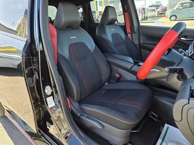 日産 オーラ ニスモ 鹿児島県 2023(令5)年 8.3万km スーパーブラック プロパイロット　/デジタルインナーミラー　/アラウンドビューモニター　/ＮＩＳＳＡＮコネクトナビ　/ＮＩＳＭＯ純正アルミホイール（１７インチ）　/ビルトインＥＴＣ２．０　/ＮＩＳＭＯ専用ハーフレザーシート/前後コーナーセンサー/Bluetoothオーディオ/フルセグテレビ/横滑り防止装置/レーンキープアシスト/プッシュスタート/スマートキー