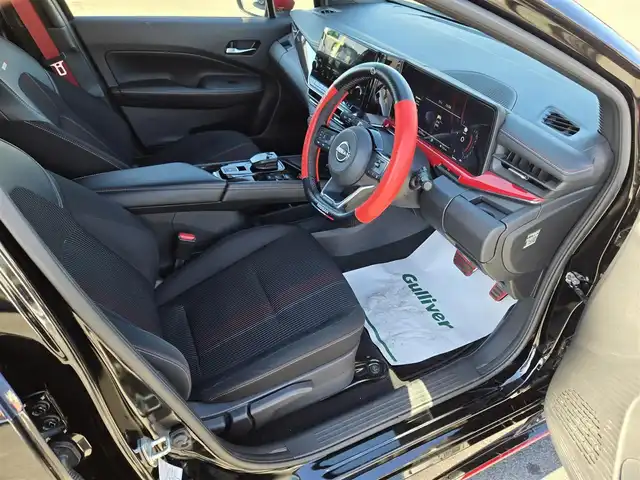 日産 オーラ ニスモ 鹿児島県 2023(令5)年 8.3万km スーパーブラック プロパイロット　/デジタルインナーミラー　/アラウンドビューモニター　/ＮＩＳＳＡＮコネクトナビ　/ＮＩＳＭＯ純正アルミホイール（１７インチ）　/ビルトインＥＴＣ２．０　/ＮＩＳＭＯ専用ハーフレザーシート/前後コーナーセンサー/Bluetoothオーディオ/フルセグテレビ/横滑り防止装置/レーンキープアシスト/プッシュスタート/スマートキー