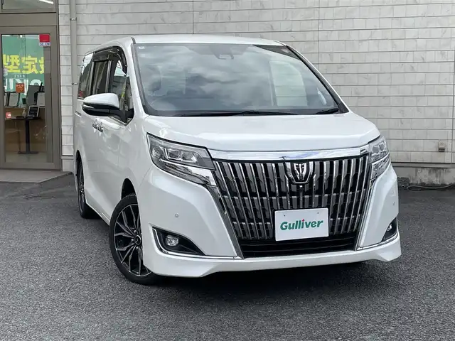 トヨタ エスクァイア Gi 大分県 2018(平30)年 7.8万km ホワイトパールクリスタルシャイン 〇ワンオーナー/〇純正メモリーナビ（NSZT-Y66T）/　CD/DVD/BT/ラジオ/フルセグ/〇純正フリップダウンモニター/〇社外17インチアルミホイール/〇バックカメラ/〇ETC/〇クルーズコントロール/〇ステアリングスイッチ/〇前後ドライブレコーダー/〇ウッドステアリング/〇アイドリングストップ/〇両側パワースライドドア/〇プリクラッシュセーフティシステム/〇レーンキープアシスト/〇オートハイビームアシスト/〇ウインカーミラー/〇クリアランスソナー/〇シートヒーター/〇フロアマット/〇ドアバイザー/〇プライバシーガラス/〇保証書/〇スペアキー