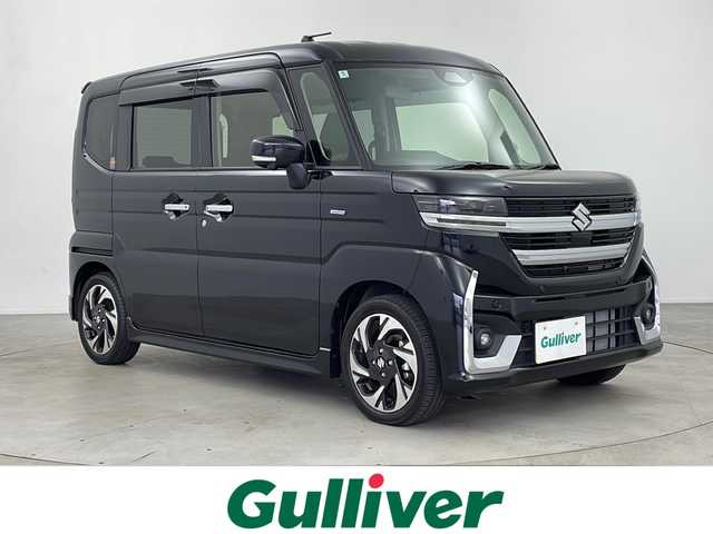 スズキ スペーシア カスタム HYBRID XS 鹿児島県 2024(令6)年 0.1万km未満 ブルーイッシュブラックパール3 登録済み未使用車　/純正ディスプレイオーディオ/（Bluetooth/AM/FM/AppleCarPlay/AndroidAuto）/全方位モニター/バックカメラ/レーダークルーズコントロール　/レーンキープアシスト　/スズキセーフティサポート　/前席シートヒーター　/オットマン　/後席サンシェード　/両側パワースライドドア/シートバックテーブル/ハーフレザーシート/ステアリングヒーター/ステアリングスイッチ/LEDヘッドライト/オートマチックハイビーム/オートライト/レーンキープアシスト