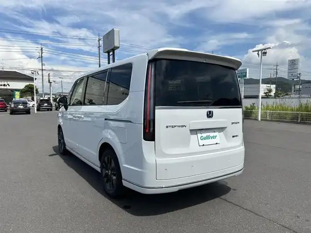 ホンダ ステップワゴン スパーダ eHEV 岡山県 2025(令7)年 0.1千km プラチナホワイトパール 登録時走行距離3km/登録済み未使用車/純正11.4インチナビ/フルセグTV(AM.FM.CD.DVD.TV.BT)/両側パワースライドドア/バックカメラ/ブラインドスポットモニター/シートヒーター/クリアランスソナー/衝突軽減ブレーキ/レーダークルーズコントロール/レーンキープアシスト/オートライト/オートマチックハイビーム/アイドリングストップ/電動リアゲート/16インチ純正AW